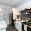 kitchen with island and white cabinets