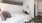 bedroom with a partial wall