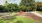 spacious dog park with play equipment