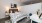 a bedroom with a work space