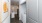 laundry closet with washer and dryer in hallway